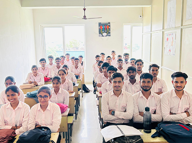 Students studying attentively in a classroom at Shree Shyam Paramedical College, Jaipur.