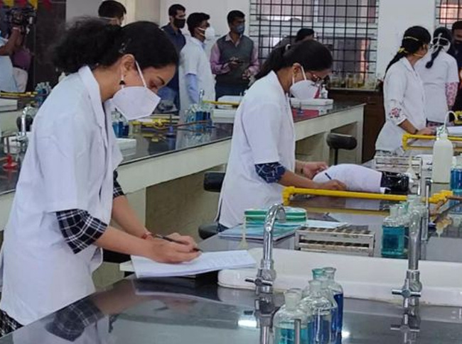 Students conducting laboratory experiments as part of practical training at Shree Shyam Paramedical College, Jaipur.